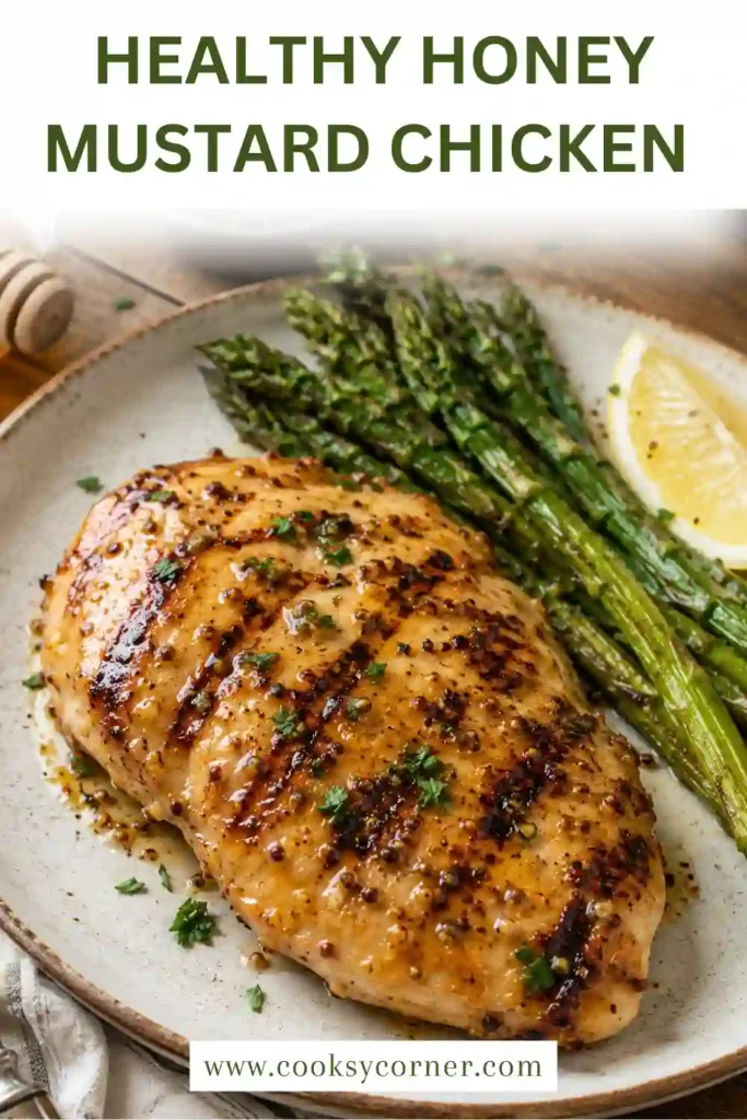 Grilled Honey Mustard Chicken with golden caramelized edges, fresh parsley, and a glossy honey mustard glaze served on a rustic platter. The juicy chicken is perfectly cooked and ready to serve.