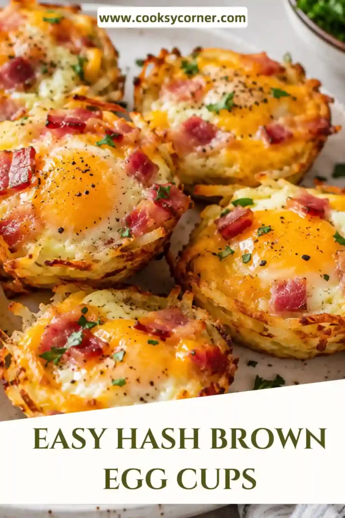 1. Crispy Hash Brown Egg Cups filled with fluffy eggs, melted cheddar cheese, turkey bacon, and fresh chives arranged on a serving platter.