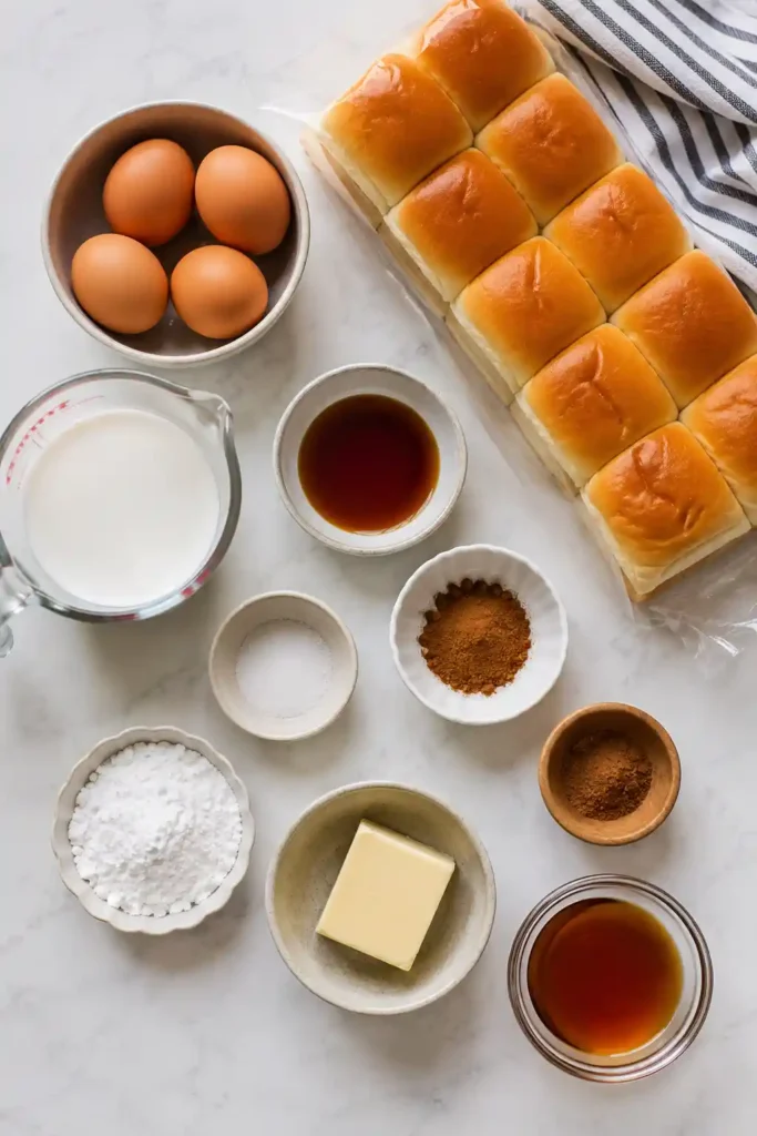 Close-up of fluffy Hawaiian Roll French Toast with syrup dripping over warm sweet rolls. A simple homemade breakfast that's ideal for family mornings.