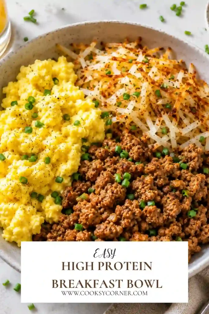 A High Protein Breakfast Bowl filled with seasoned ground turkey, fluffy cottage cheese scrambled eggs, crispy shredded potatoes, avocado, and fresh herbs. This healthy breakfast bowl is colorful, hearty, and perfect for meal prep.