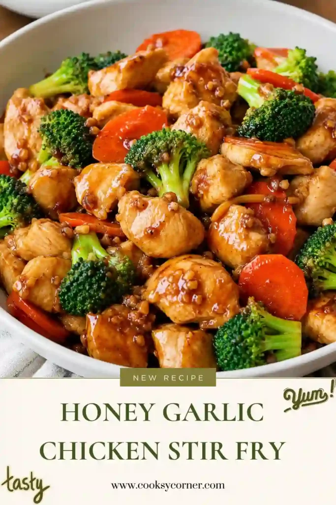 1. A bowl of Honey Garlic Chicken Stir Fry served with steamed rice. Tender chicken, broccoli, and carrots are coated in a glossy homemade honey garlic sauce.