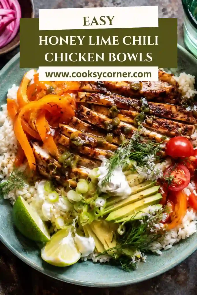 Honey Lime Chili Chicken Bowls served with roasted peppers, fluffy rice, avocado, cherry tomatoes, and fresh cilantro in a colorful bowl.