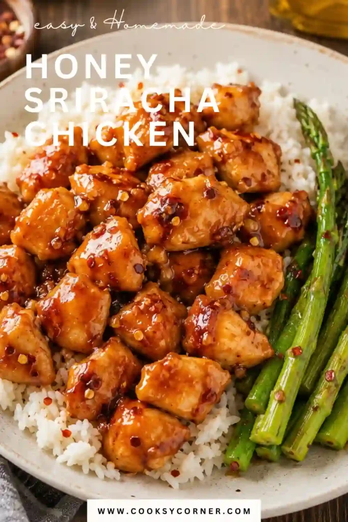 Sweet and spicy Honey Sriracha Chicken served with jasmine rice and steamed broccoli on a modern dinner plate.