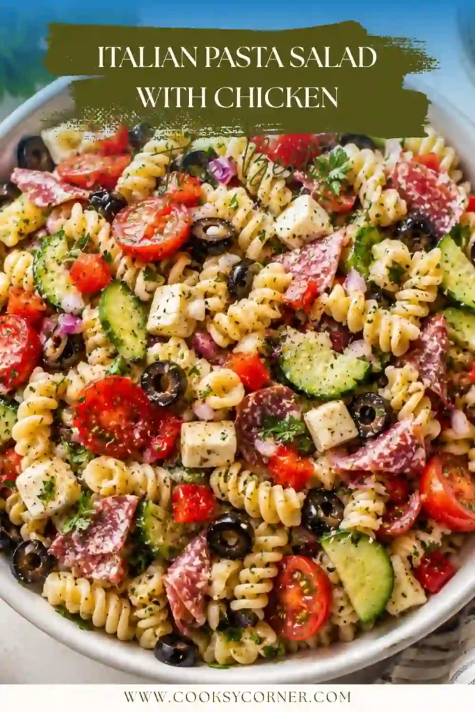 Fresh Italian Pasta Salad Recipe topped with shredded Parmesan, chopped parsley, cherry tomatoes, cucumbers, and homemade vinaigrette. A delicious make-ahead meal for lunch or dinner.