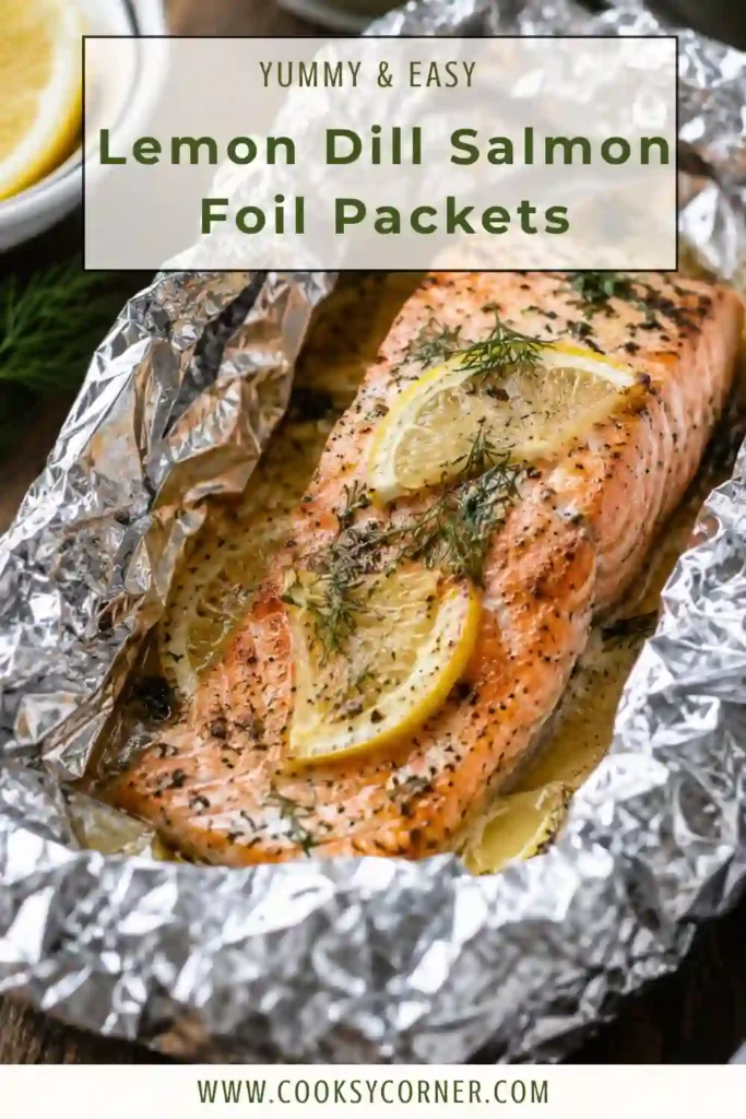 An overhead view of ingredients for Lemon-Dill Salmon Foil Packets featuring fresh salmon, lemon slices, dill, butter, olive oil, garlic, salt, and pepper. A healthy seafood recipe prepared with simple, fresh ingredients.