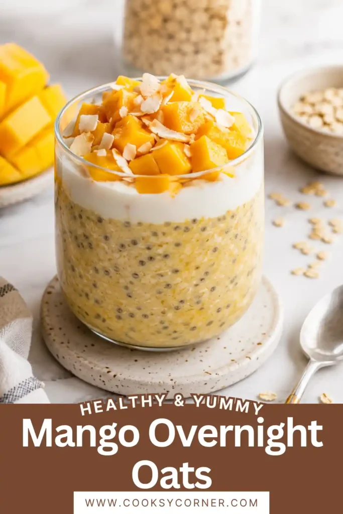 Creamy Mango Overnight Oats served in a glass jar with fresh mango cubes and toasted coconut flakes. This healthy overnight oats recipe is perfect for an easy meal prep breakfast.