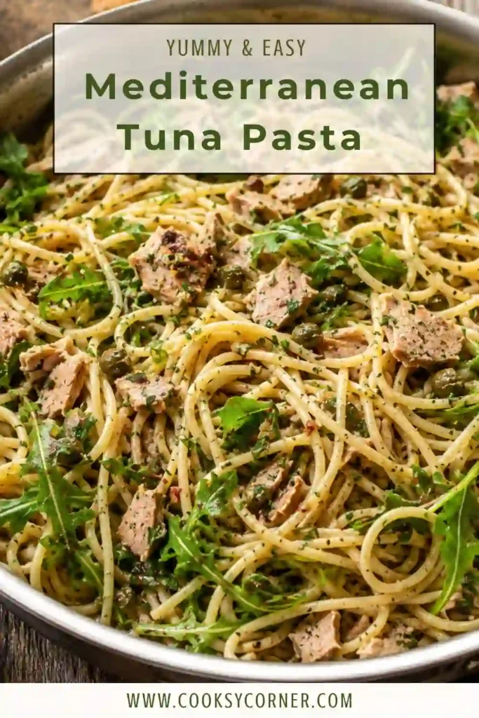 Mediterranean Tuna Pasta garnished with chopped parsley and freshly ground black pepper in a serving bowl. This easy tuna spaghetti recipe is light, colorful, and packed with Mediterranean flavors.