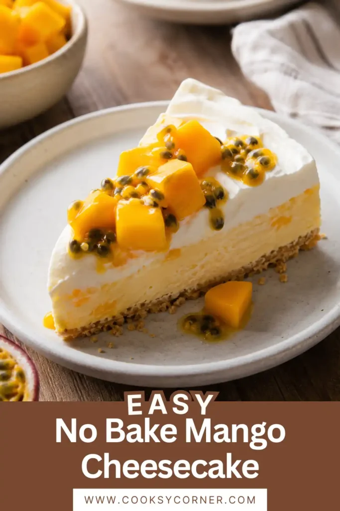 Homemade No Bake Mango Cheesecake decorated with whipped cream swirls, fresh mango chunks, and passion fruit. This tropical cheesecake is creamy, refreshing, and beautifully layered.