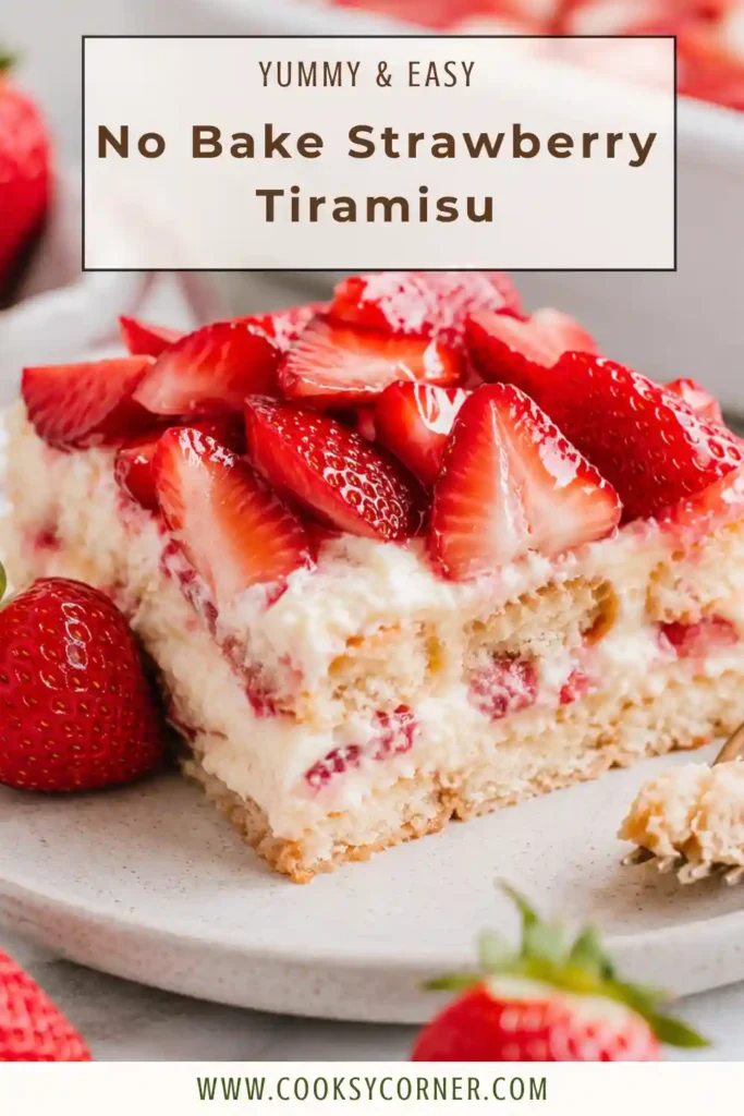 A slice of No-Bake Strawberry Tiramisu topped with fresh strawberries and mascarpone cream served on a dessert plate. Distinct layers are visible in every bite.