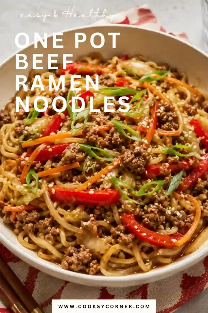 Freshly cooked ground beef ramen noodles served warm with cabbage, carrots, red peppers, scallions, and toasted sesame seeds. An easy homemade noodle dinner ready in just 30 minutes.