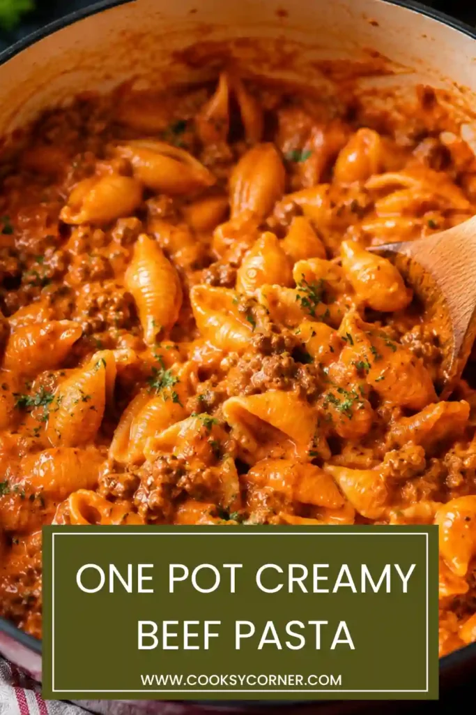 One Pot Creamy Beef Pasta made with seasoned ground beef, shell pasta, and creamy tomato sauce, garnished with fresh parsley. A hearty family dinner recipe.