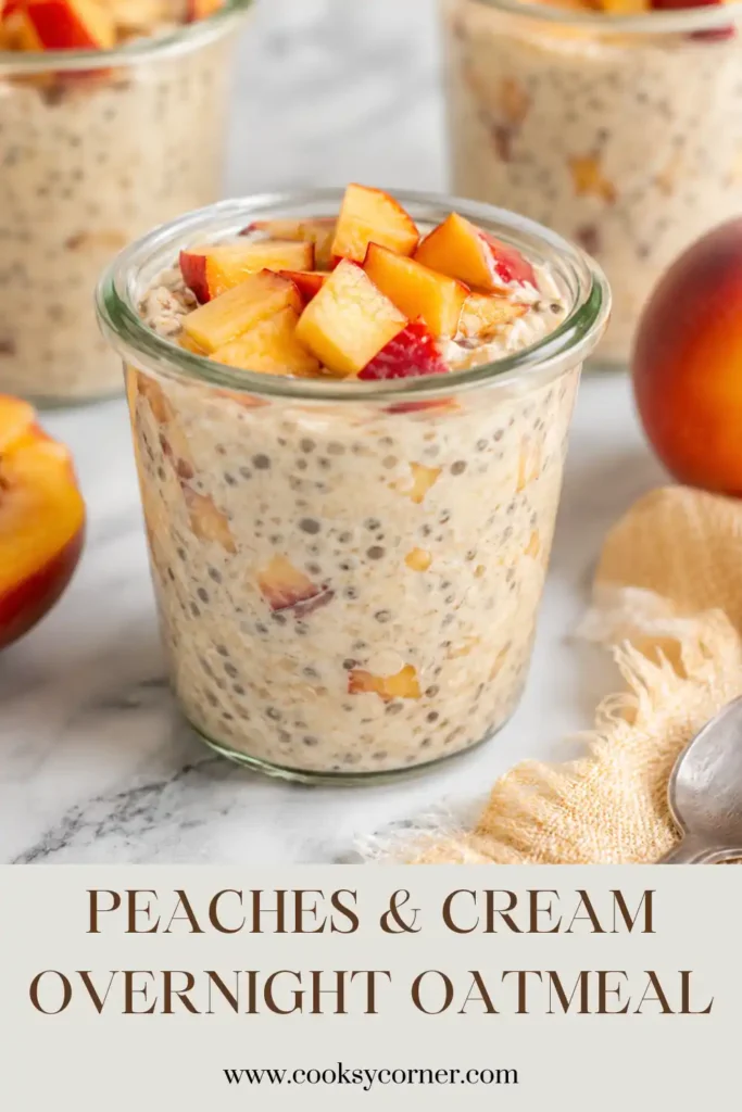 Ingredients for Peaches & Cream Overnight Oatmeal arranged on a white marble countertop with fresh peaches, rolled oats, chia seeds, maple syrup, vanilla, cinnamon, non-dairy milk, and vegan yogurt.