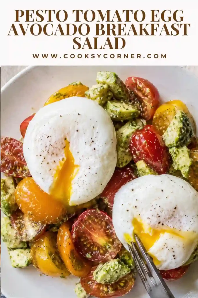 Healthy Pesto Tomato Egg Avocado Breakfast Salad served with creamy avocado, juicy tomatoes, Parmesan, and perfectly cooked poached eggs. A simple breakfast that's both nutritious and satisfying.