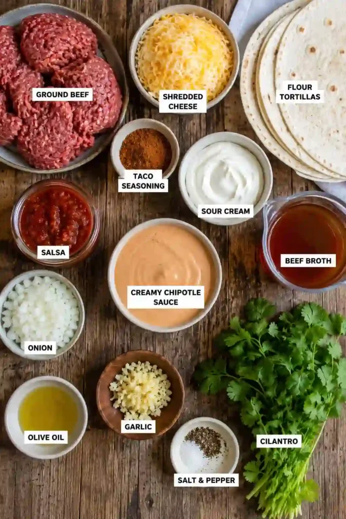 Freshly baked Savory Smothered Ground Beef Burritos with Creamy Chipotle Delight featuring tender ground beef, creamy chipotle sauce, and melted cheddar cheese in a baking dish.