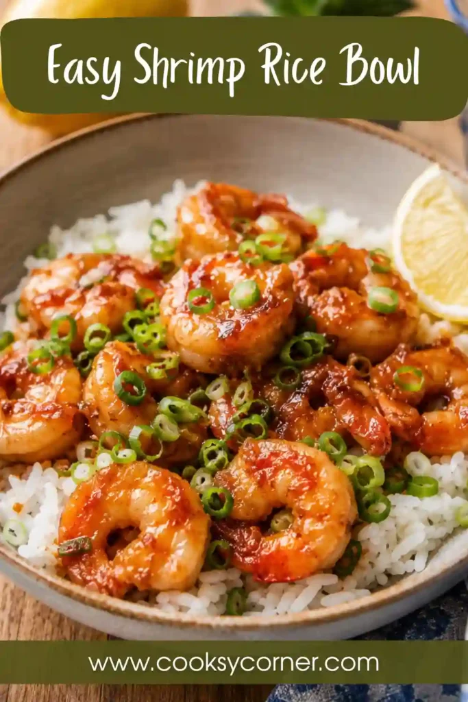 Juicy garlic butter shrimp served over steamed rice with lemon wedges and green onions in a healthy shrimp rice bowl. A simple Asian-inspired meal full of flavor.