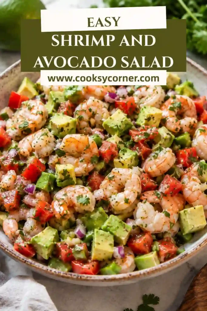 Homemade shrimp avocado salad with chopped tomatoes, jalapeños, and lime dressing served in a white bowl. A refreshing, protein-rich meal perfect for lunch.