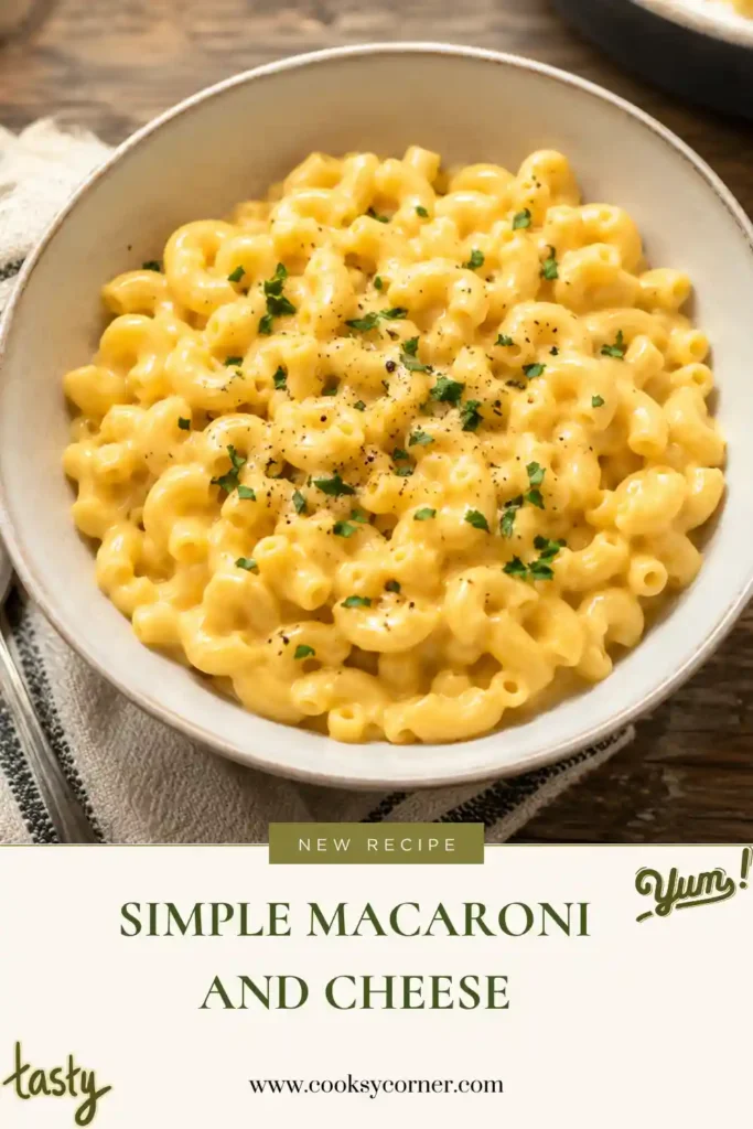 A bowl of Simple Macaroni and Cheese coated in a rich, creamy cheddar cheese sauce. This homemade comfort food features tender elbow macaroni with a smooth, cheesy texture.