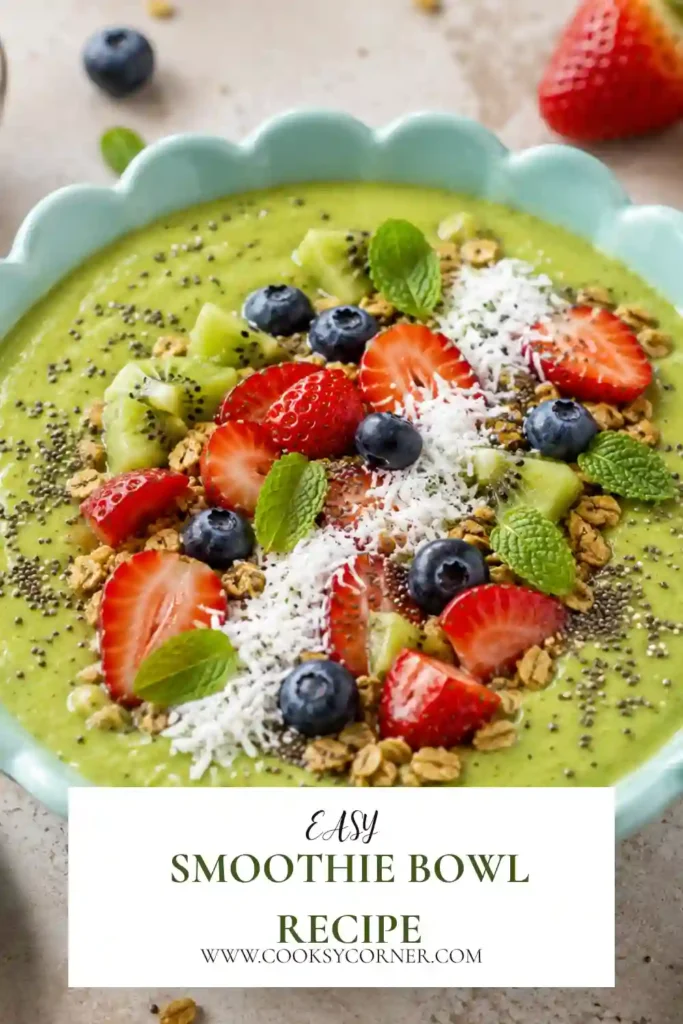 3. Thick green smoothie bowl made with tropical mango, ripe banana, avocado, and fresh greens. Finished with fresh fruit toppings for added texture and flavor.