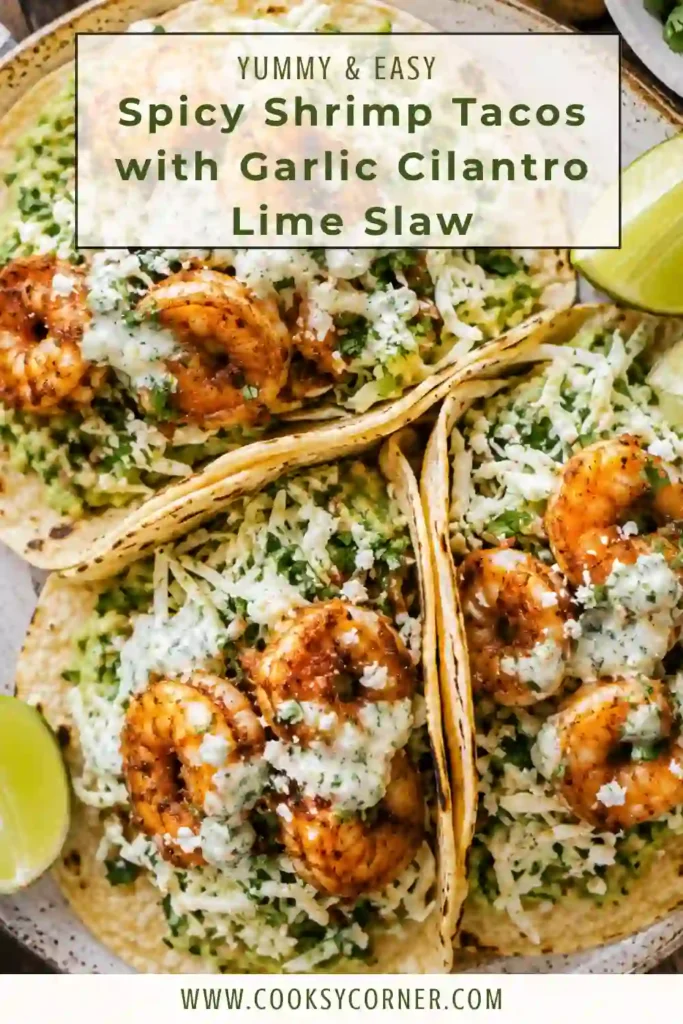 Homemade spicy shrimp tacos filled with smoky shrimp, crunchy cabbage slaw, creamy cilantro lime sauce, and fresh avocado.