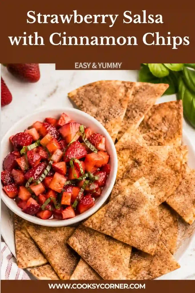 Homemade Strawberry Salsa Recipe featuring chopped strawberries, fresh basil, and lemon juice served alongside golden cinnamon tortilla chips. Perfect for summer entertaining.