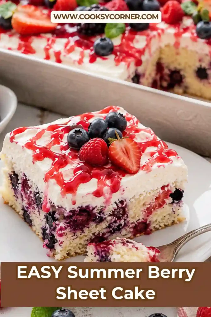 Summer Berry Sheet Cake topped with fluffy cream cheese frosting, berry swirl, and fresh blueberries. Each slice is filled with juicy blueberries and raspberries.