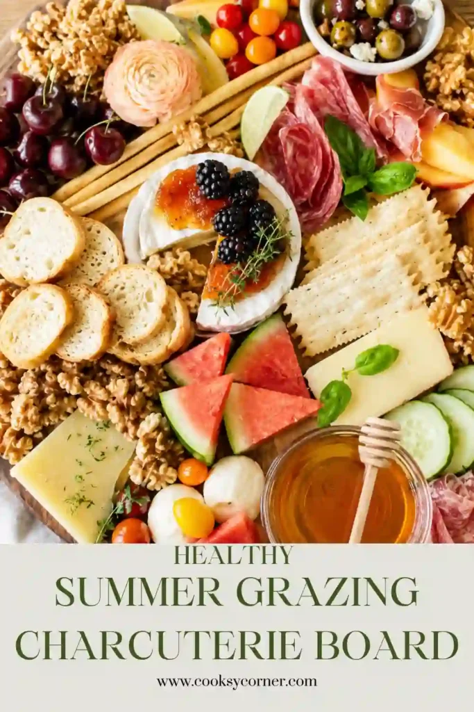 2. An elegant summer charcuterie board featuring seasonal fruit, creamy cheeses, crunchy nuts, honey, fig jam, and smoked turkey slices beautifully arranged on a wooden serving board.