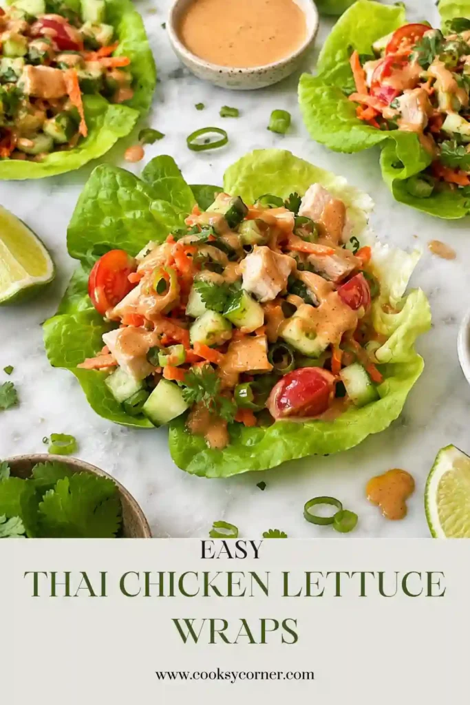 1. Fresh Thai Chicken Lettuce Wraps served in crisp butter lettuce with shredded chicken, cucumber, carrots, tomatoes, cilantro, and creamy peanut sauce. A colorful healthy dinner packed with fresh ingredients.