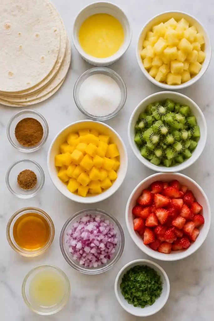 Sweet tropical fruit salsa with fresh mint and lime served with crispy baked cinnamon chips for dipping.