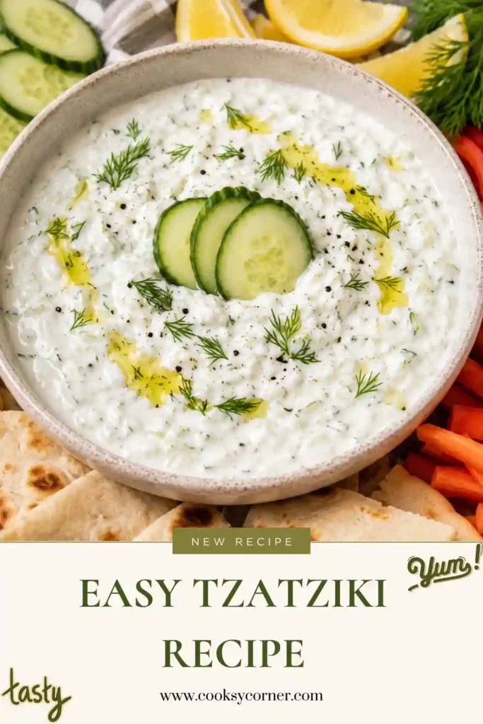 A bowl of authentic Greek Tzatziki Recipe made with cucumber, Greek yogurt, garlic, dill, and lemon juice. Smooth, creamy, and served with warm pita bread.
