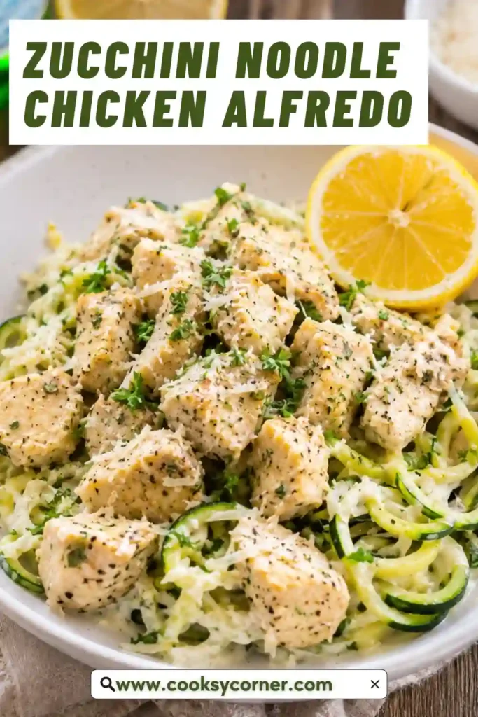 Overhead view of healthy Alfredo ingredients including zucchini, chicken breasts, butter, garlic, heavy cream, Parmesan cheese, and parsley.