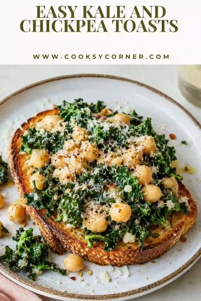 Protein-rich chickpea toast with wilted kale, fresh herbs, lemon, and Parmesan served on crunchy sourdough. Ideal for an easy lunch recipe.