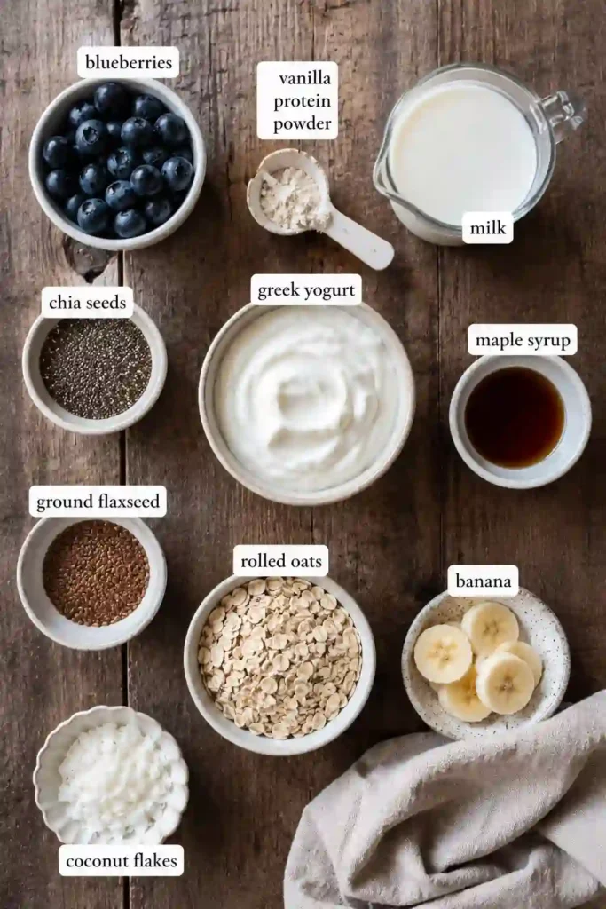 Protein-packed blueberry smoothie bowl with creamy yogurt, mixed berries, granola, and coconut chips. A quick and wholesome breakfast recipe.