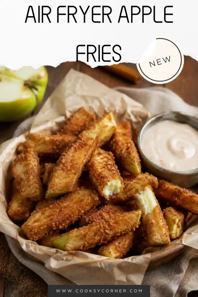 Homemade Air Fryer Apple Fries arranged on a serving plate with cinnamon sugar and vanilla dipping sauce. The apple fries are golden outside with soft apple centers.