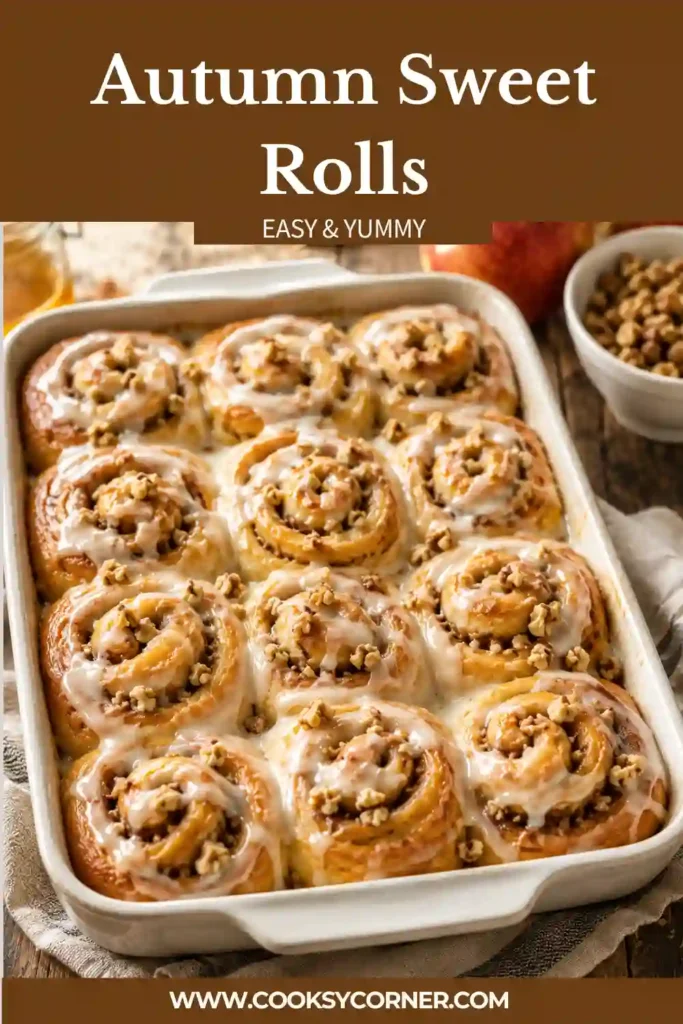 Homemade apple cinnamon rolls made with pumpkin-spiced yeast dough and fresh apple filling. Each soft roll is finished with sweet cider glaze and chopped toasted walnuts.