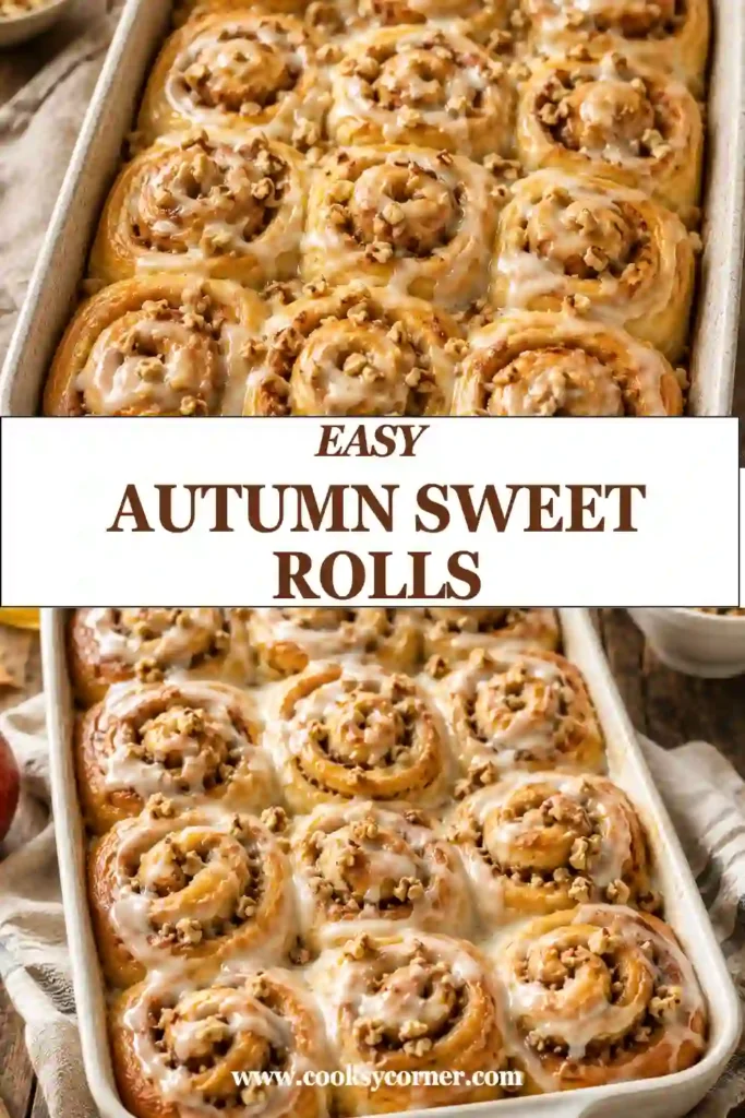 Pumpkin sweet rolls filled with chopped apples and cinnamon sugar in a baking dish. The golden rolls are topped with a smooth apple cider glaze and toasted walnuts.