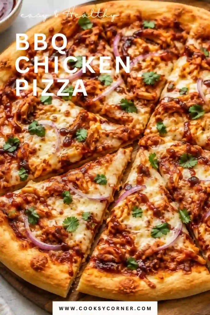 Homemade barbecue chicken pizza baked until golden brown with melted cheese, red onions, and fresh cilantro on top.