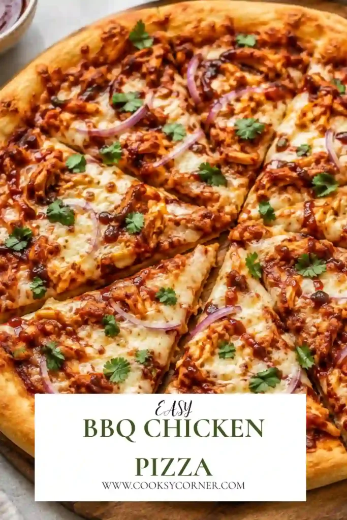 Freshly baked BBQ Chicken Pizza topped with barbecue chicken, mozzarella, smoked Gouda, and red onion on a golden homemade pizza crust. Melted cheese and smoky barbecue sauce create a delicious homemade pizza.