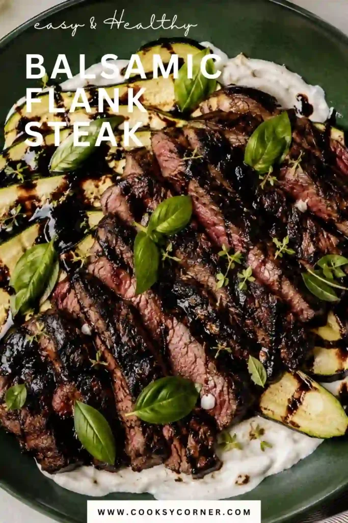 Juicy grilled flank steak with visible grill marks served alongside tender zucchini and smooth whipped feta. The balsamic steak marinade gives the beef a savory, tangy finish.