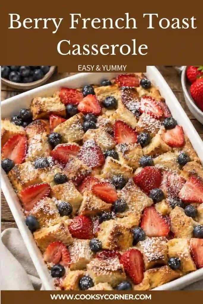 Close-up of Berry French Toast Casserole served with maple syrup and powdered sugar.