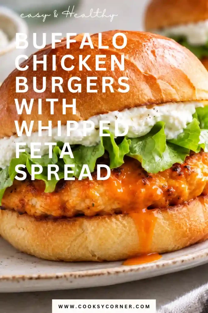 Close-up of a Buffalo Chicken Burger with a juicy buffalo-seasoned chicken patty, lettuce, and creamy feta spread. A flavorful homemade chicken burger served on a soft bun.