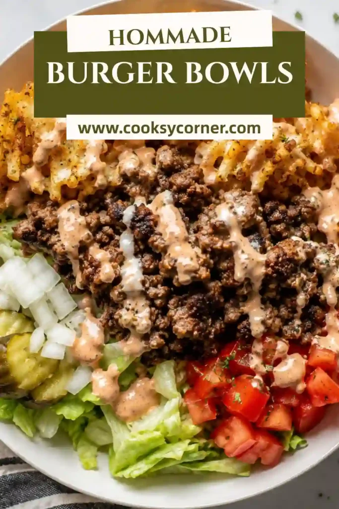 1. A delicious Burger Bowl topped with juicy seasoned ground beef, shredded lettuce, tomatoes, pickles, homemade house sauce, and crispy ranch waffle fries. This easy dinner recipe is colorful, hearty, and family-friendly.