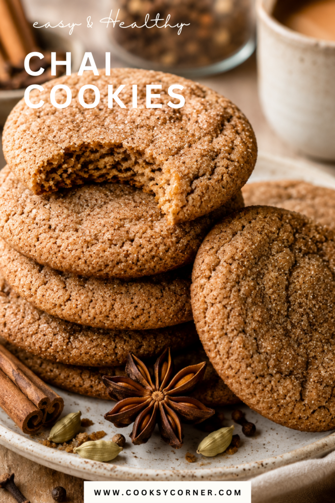 A stack of homemade Chai Cookies made with brown butter, cinnamon, ginger, cardamom, nutmeg, and cloves. The cookies have soft centers and a sparkling spiced sugar coating.