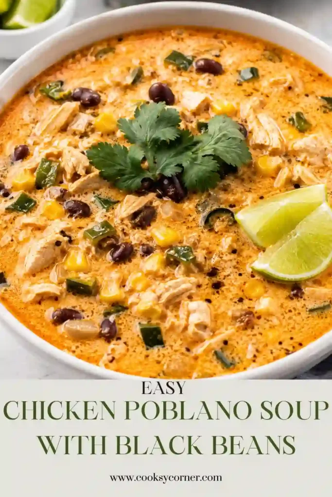 Creamy Chicken Poblano Soup served in a bowl with shredded chicken, black beans, corn, and poblano peppers. Fresh cilantro adds a colorful finish to this easy Mexican-inspired soup.