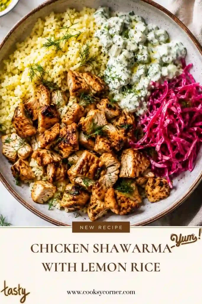 A bowl of Chicken Shawarma with Lemon Rice served with purple cabbage salad and creamy feta cucumber sauce. This colorful Mediterranean dinner features juicy seasoned chicken and fluffy citrus-infused rice.