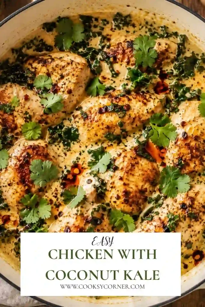 A skillet of Chicken with Coconut Kale featuring golden chicken breasts in a creamy coconut curry sauce with tender kale. Served over fluffy white rice for a comforting weeknight dinner.