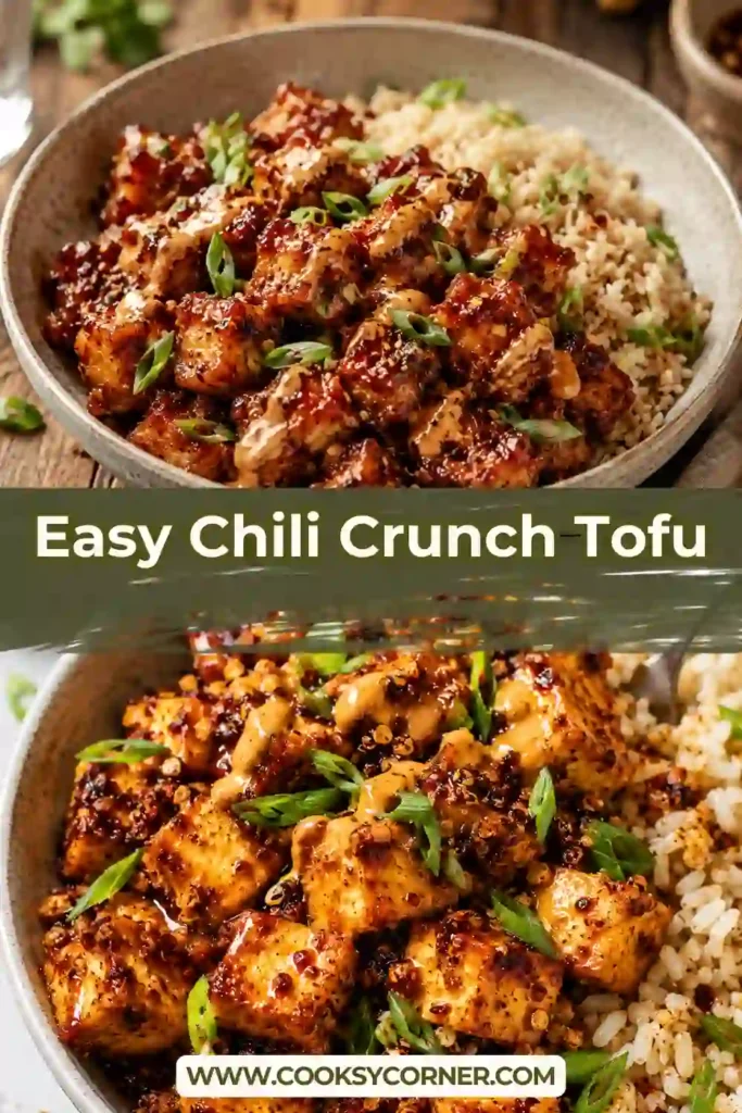 Close-up of crispy baked Chili Crunch Tofu coated in spicy chili crisp sauce with fluffy white rice and fresh green onion garnish. Every bite is packed with crunchy texture and savory flavor.