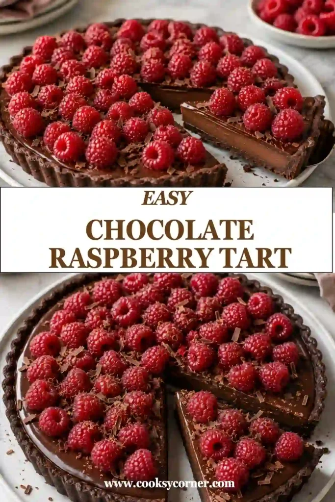 Easy Chocolate Raspberry Tart topped with rows of fresh raspberries and a light dusting of confectioners' sugar. The tart features creamy chocolate ganache and a crunchy Oreo crust.