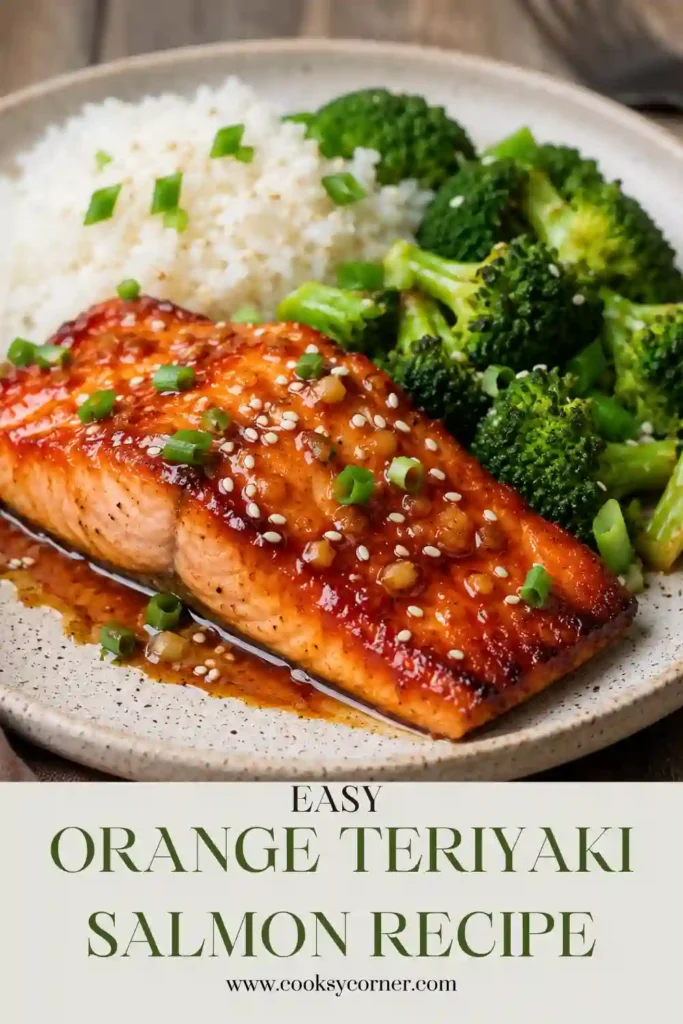 Tender baked teriyaki salmon coated in homemade orange teriyaki sauce with ginger and garlic. The glossy salmon fillet is served with steamed rice for a simple dinner.