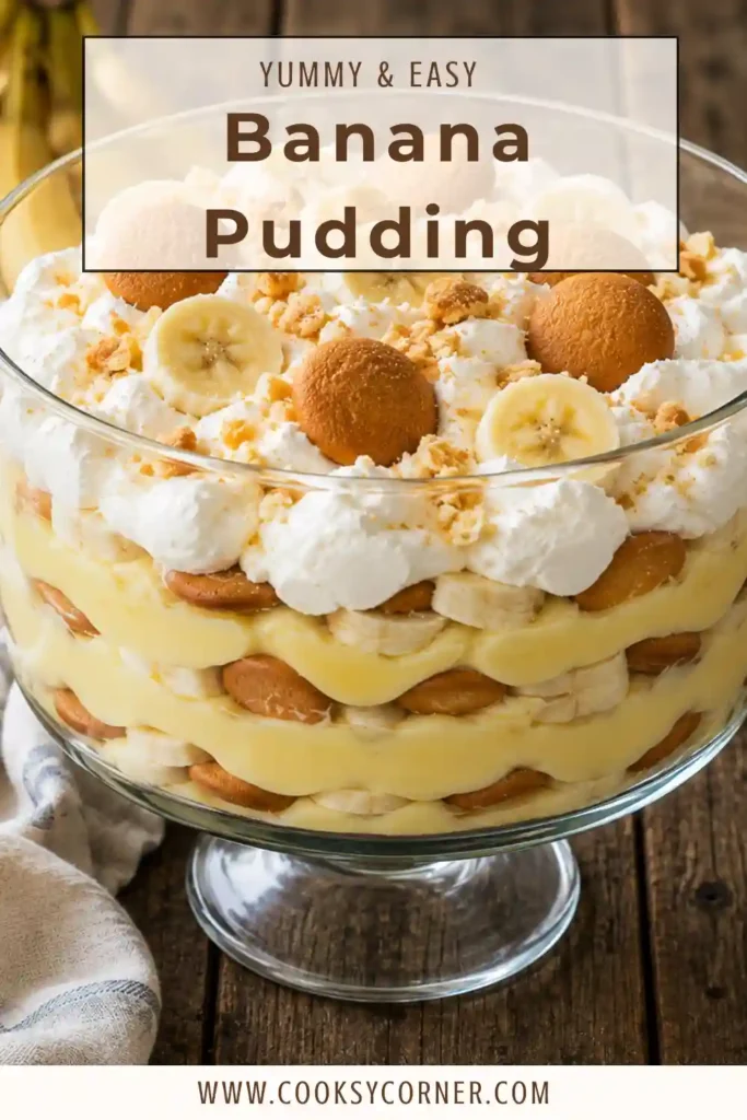 Creamy homemade banana pudding layered with vanilla pudding, bananas, whipped cream, and vanilla wafers in a glass serving bowl.
