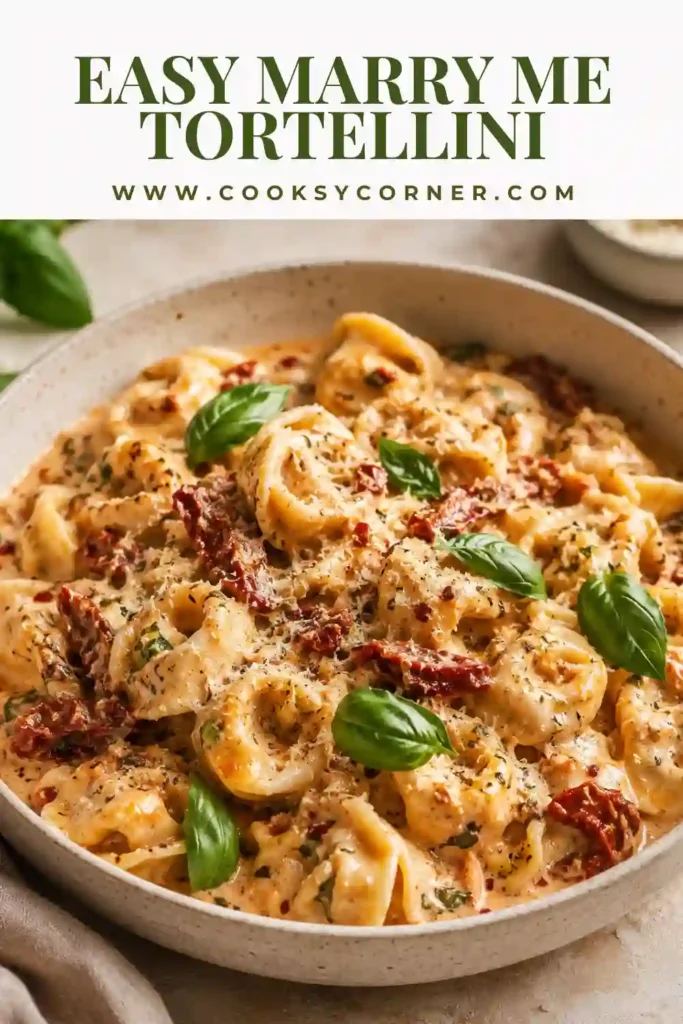Marry Me Tortellini with cheese-filled pasta, sun-dried tomatoes, and spinach in a creamy Parmesan sauce. The one-pot tortellini is finished with herbs and freshly grated cheese.